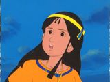 an image of a young girl in a yellow shirt with a yellow headband