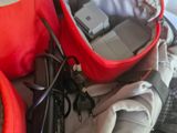 a red bag that is sitting on top of a table