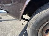 a close up of a tire on the side of a truck