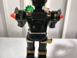 a toy robot that is sitting on a table