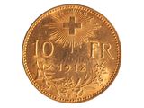 l'image d'une pièce d'or portant une croix