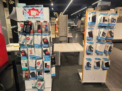 many cell phones on display in the store for sale