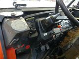 a close up of a steering wheel and dashboard of a vehicle