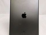 an apple ipad is sitting on a table with a white background