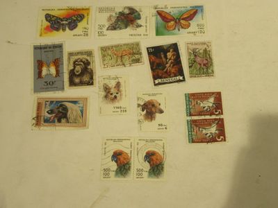 a lot of stamps that are on the table