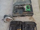 a tool box with a hammer and other tools on the floor
