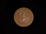 an image of a gold coin on a black background
