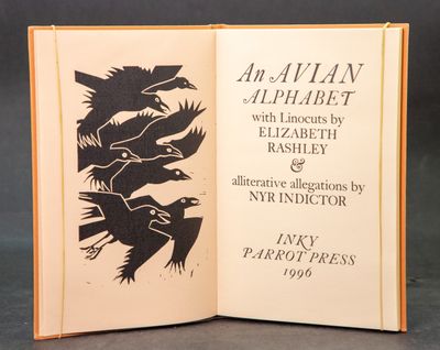 an open book with a picture of birds on it