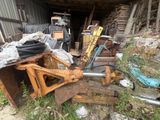 a pile of junk in front of a building