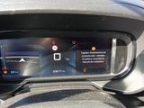 the dashboard of a car with a digital display on the dash