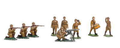 figurines of soldiers with guns on a white background