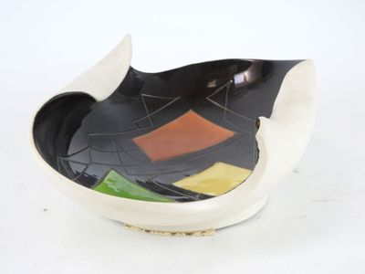 a black and white bowl with a colorful design on it
