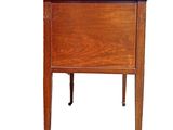 an image of a small wooden table with a drawer on it