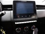 a picture of a car dashboard with a tablet on it