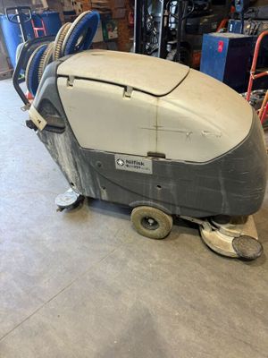 the machine is clean and ready to use in the garage