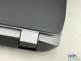 a close up view of a laptop with a broken keyboard