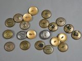 a lot of buttons that are on a table