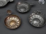 a lot of different metal items that are on the table