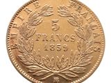 an image of a gold coin with a wreath of leaves on it