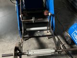 a machine that is sitting on the floor in the garage