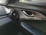 a close up of a steering wheel in a car