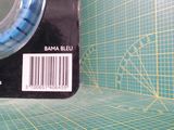 une photo montrant un gros plan d'un morceau de papier posé sur un tapis de découpe