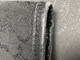 a close up of a piece of fabric with a black background