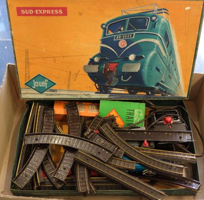 a box with a train set in it on a table