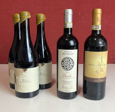 plusieurs bouteilles de vin sont alignées sur une table