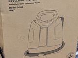 packaging of a box with a picture of a vacuum on top of a pile of boxes