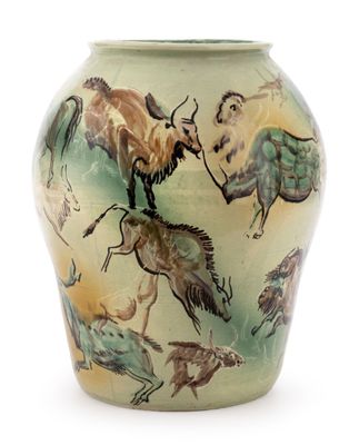 a vase that has a painting of animals on it
