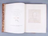 an open book with a picture of a man on it