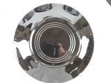 a reflection of a dog in a bowl on a table