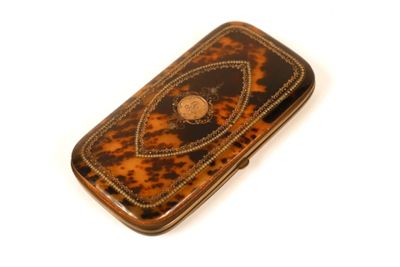 a cell phone that is sitting on a white surface