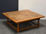 an image of a wooden coffee table with a tile top