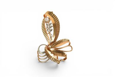 an image of a gold and diamond ring with a leaf design