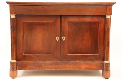 a small wooden cabinet with two doors on it