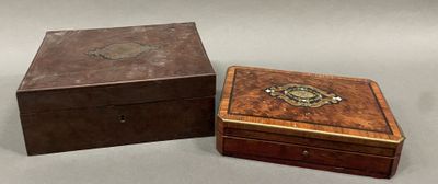 pair of antique wooden boxes with metal decoration on top of them