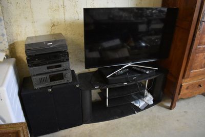 a lot of electronics that are sitting on the floor