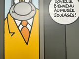 a cartoon picture of a cat in a suit and tie