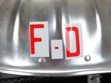 a metal helmet with the word f d written on it