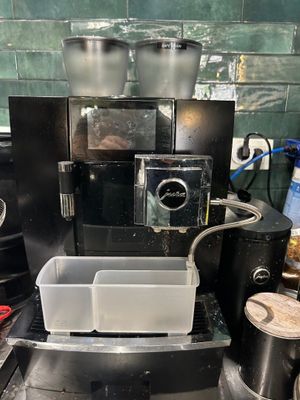 a coffee machine that is sitting on a counter