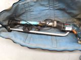 a drill in a bag on the floor