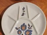 three plates that have different designs on them