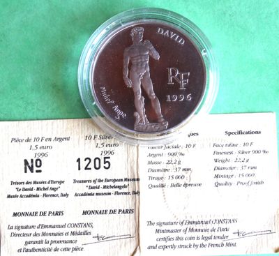 a picture of a coin with a picture of a man on it