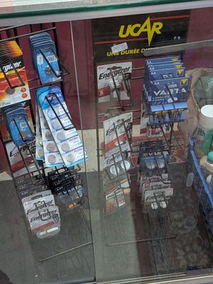 a glass display case that has various items in it
