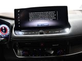 a car dashboard with a digital display in the center