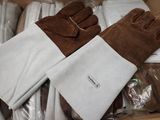 a box of gloves and gloves sitting on top of each other