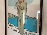 a picture of a woman that is standing in the bathroom