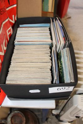 a suitcase full of books sitting on top of a table